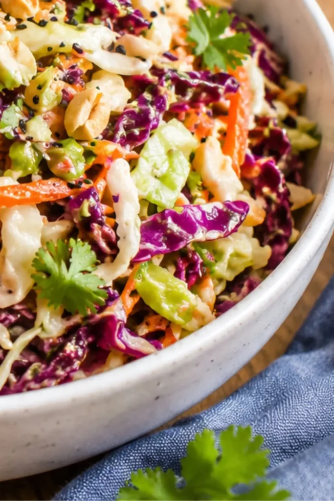 Crunchy Asian Slaw with Peanut Ginger Sauce