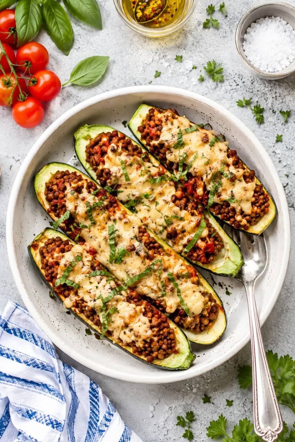 Stuffed Zucchini Boats with Spicy Lentils and Vegan Cheese