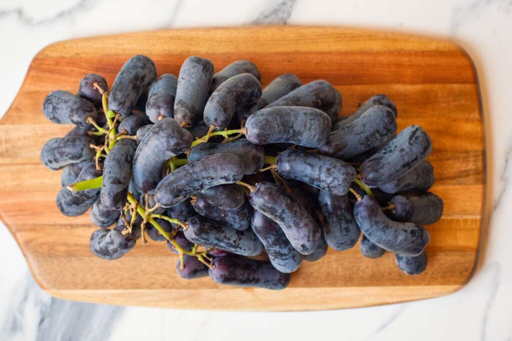 Poison Apple Plant-Based Salami Roses with Black Moon-Drop Grapes