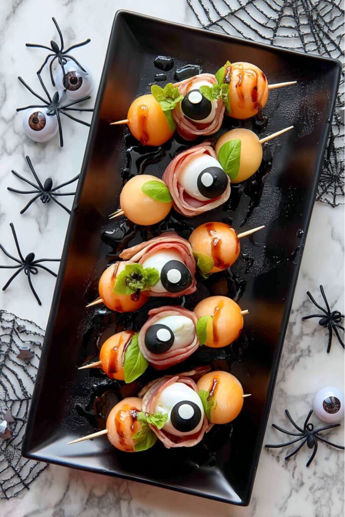 Creepy "Eyeball" Tofu-Mozzarella & Marinated Olive Skewers