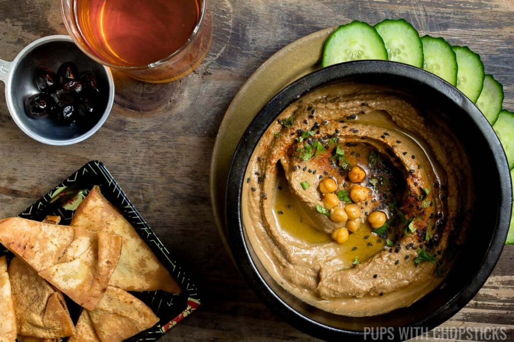 Witch's Cauldron Black Garlic Hummus with Bat Chips